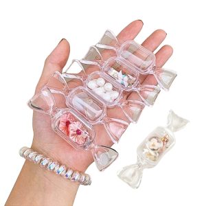 Set 10 organizatoare bijuterii portabile Salestore.ro® pentru obiecte mici precum bomboane, cercei, lantisoare, bratari, inele, elastice de par, medicamente. Gaseste rapid si usor! Cutii plastic cu capac, 8 x 2, 5 cm/ Transparent